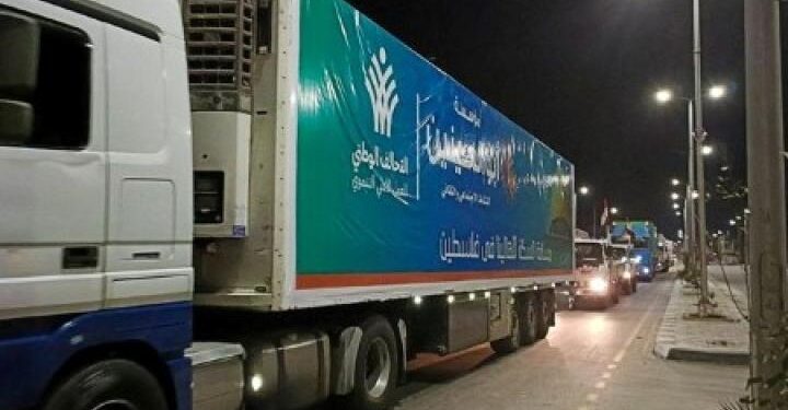 Trucks carrying humanitarian aid start entering Gaza via Egypt