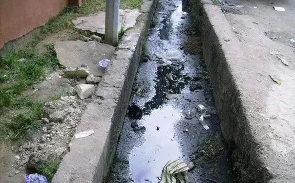 Police apprehend tenants for disposing excreta into gutter in Port Harcourt