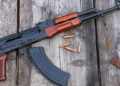 Vulcaniser hit by stray bullet as man wrestles gun from prison officer