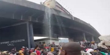 Residents warned to stop scooping diesel from  fallen tanker