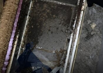 Pastor goes into hiding after body found buried in church