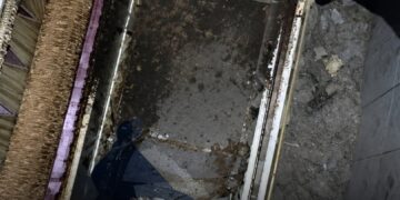Pastor goes into hiding after body found buried in church