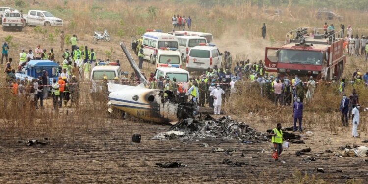 Helicopter crashes in swampy area inside creek